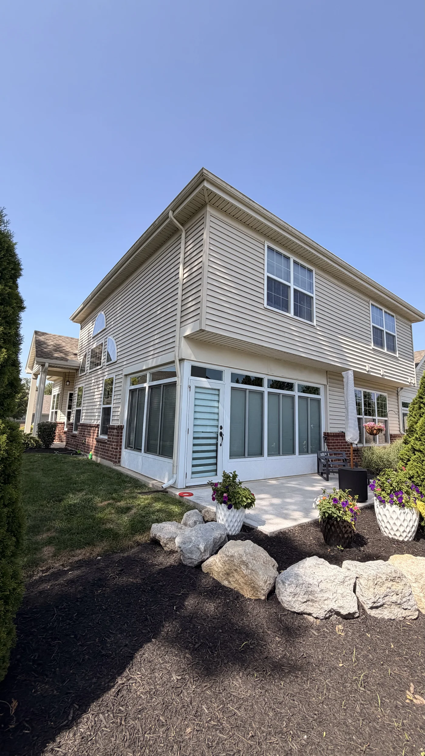 Two-story Centerville patio home with freshly cleaned exterior windows